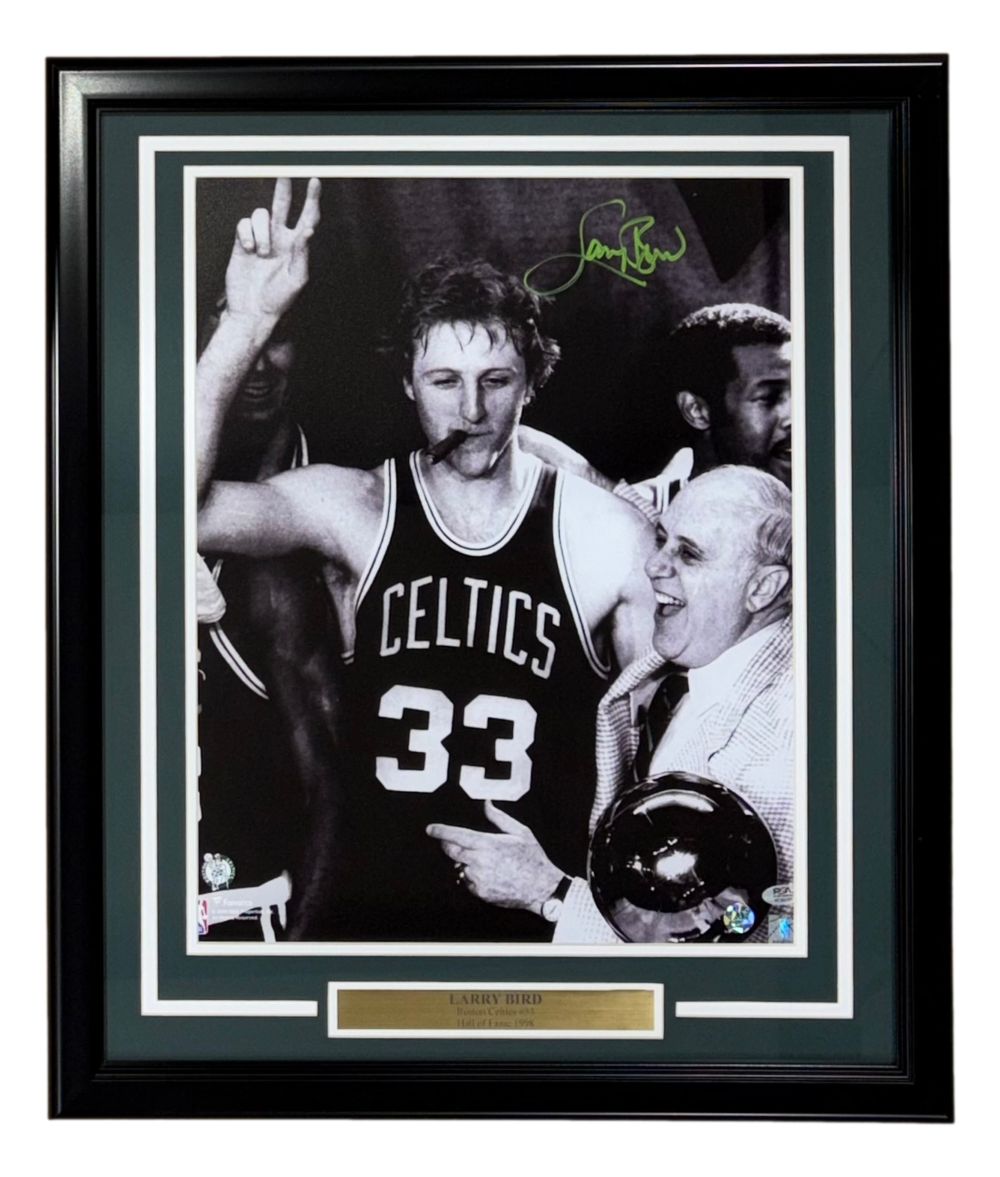 Sports Integrity Larry Bird Signed Framed 16x20 Boston Celtics Photo features Bird (#33) with Red Auerbach, posing with two fingers and a cigar. Includes green autograph and PSA/DNA authentication.