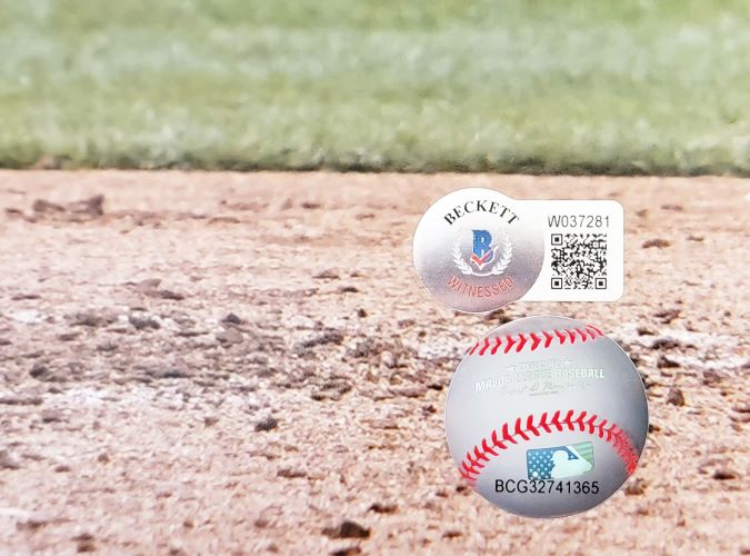 A Bobby Witt Jr signed 16x20 Kansas City Royals photo (Sports Integrity) features two authentication stickers: a silver Beckett Witness QR code sticker and a white barcode sticker labeled BCG32741365 with an American flag.