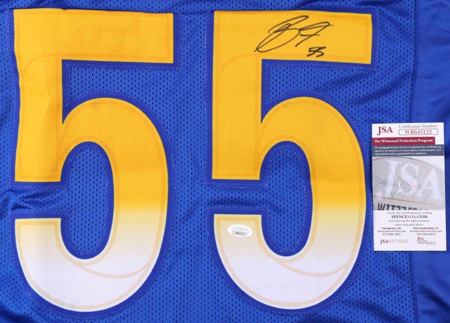 The Sports Integrity Braden Fiske Los Angeles blue mesh football jersey features a large yellow number 55, signed in black marker, and includes JSA authentication card and sticker.