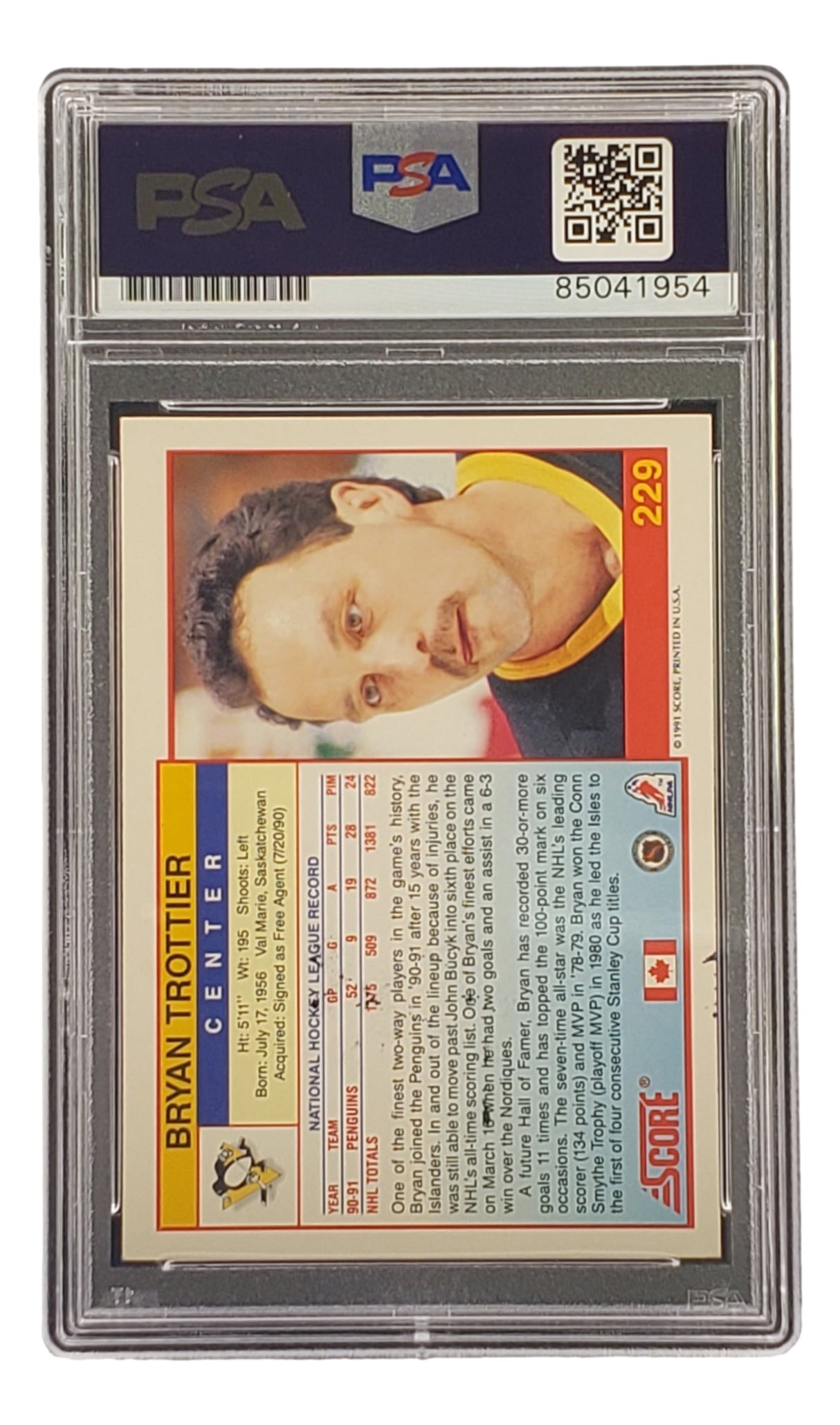 The Bryan Trottier Signed 1991 Score #229 Pittsburgh Penguins Hockey Card by Sports Integrity is PSA/DNA authenticated, featuring his profile and stats, encased in a clear holder with PSA label and barcode on top.
