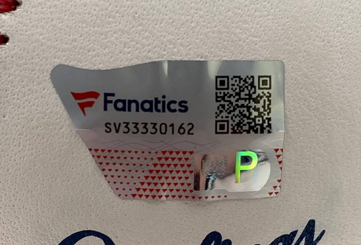 A close-up of a Fanatics authentication sticker with QR code SV33330162 and holographic P on a Bryce Harper Philadelphia Phillies Signed Official MLB Baseball w/ Case by Sports Integrity.