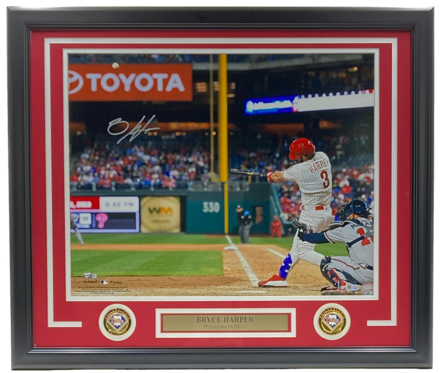 Sports Integrity's Bryce Harper Signed Framed 16x20 Philadelphia Phillies Photo (Fanatics/MLB), matted in red with a nameplate and two commemorative pins, features Harper swinging a bat in his Phillies uniform.