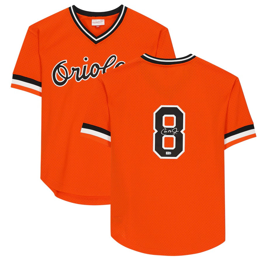 Front and back of the orange Cal Ripken Jr Signed Baltimore Orioles Mitchell & Ness Jersey by Sports Integrity, featuring Orioles script on front, a large signed #8 on back, and black-and-white trim on sleeves and collar.