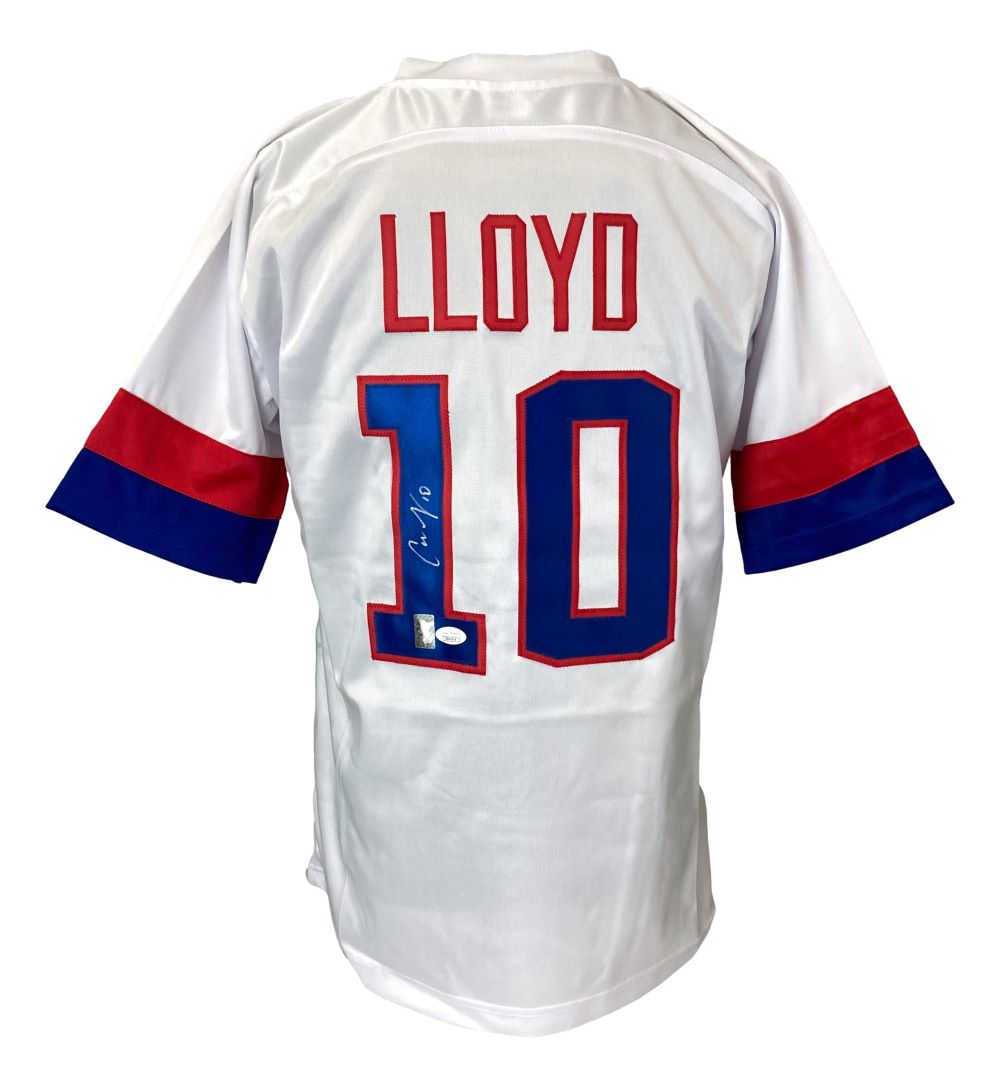 The Sports Integrity Carli Lloyd USA Signed White Soccer Jersey features red and blue sleeve stripes, LLOYD in red, number 10 in blue with a red outline on the back, and Carli Lloyd’s signature on the number 1.