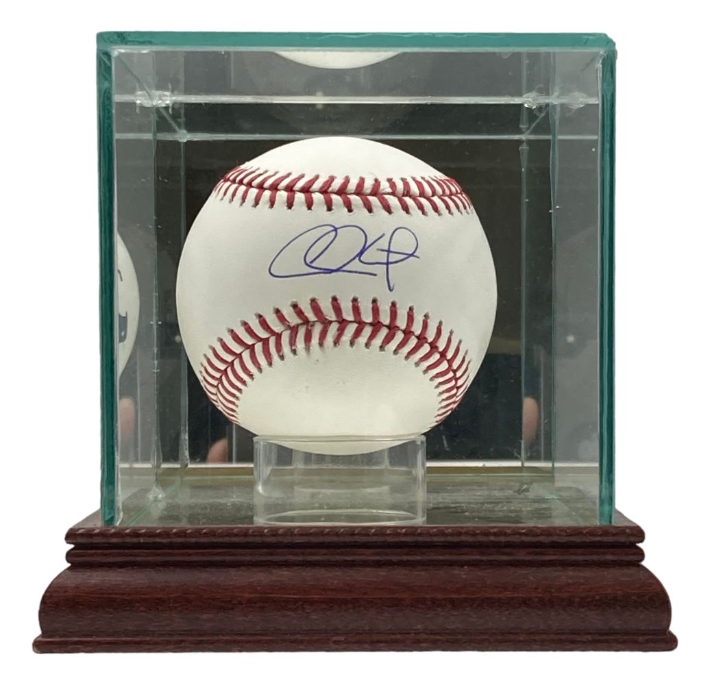 The Sports Integrity Chase Utley Philadelphia Phillies Signed Official MLB Baseball is showcased in a glass case with a wooden base. His blue ink signature is clearly visible on the front.