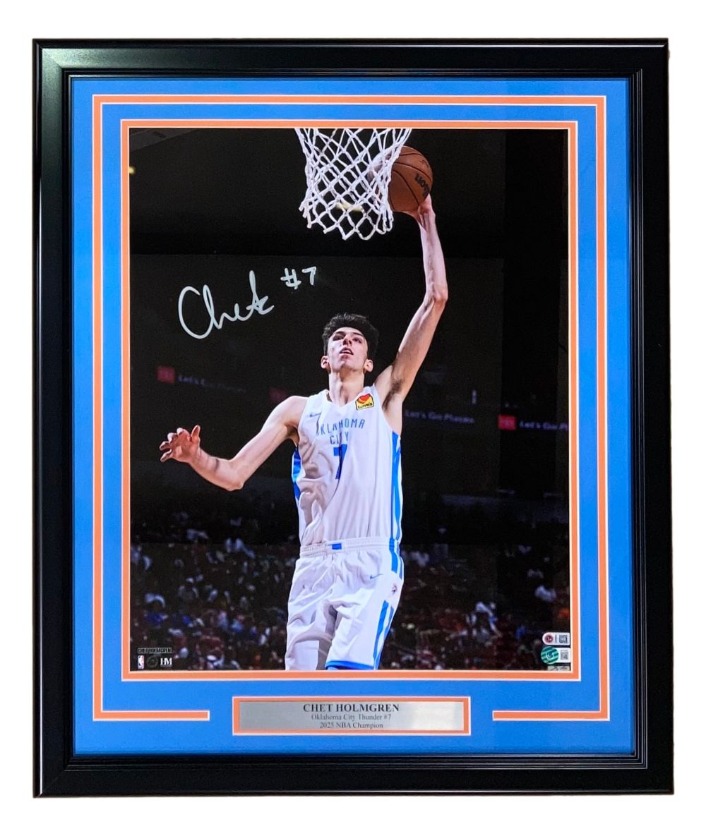 The Sports Integrity Chet Holmgren Signed Framed 16x20 Oklahoma City Thunder Photo (BAS) features an autographed image of Holmgren in his #7 jersey, ready to score, with a name plaque at the bottom.