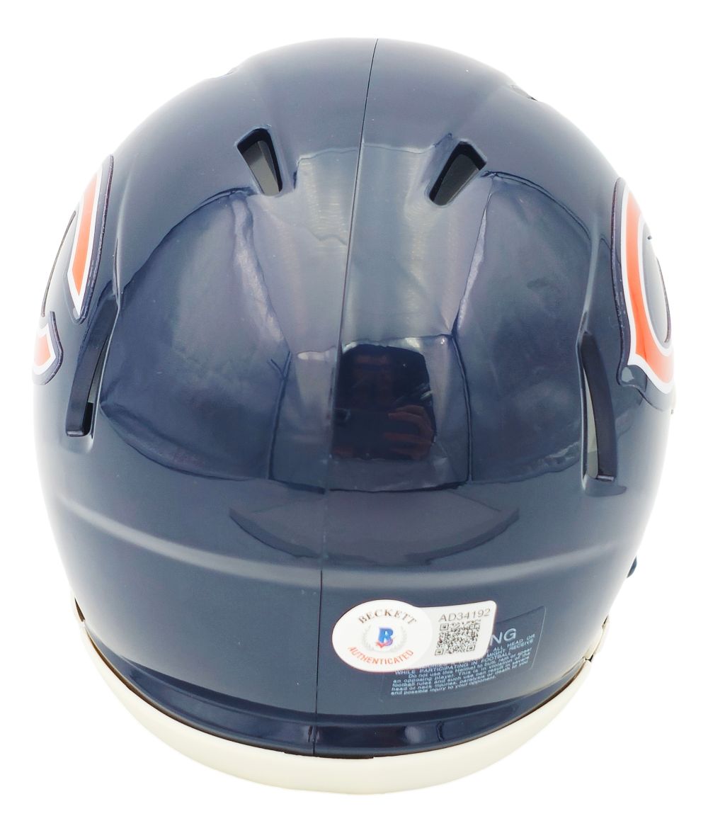 A Chevy Chase signed Chicago Bears mini speed helmet by Sports Integrity, shown from the back with ventilation slots, partial team logos on each side, and a BAS authentication sticker near the bottom.