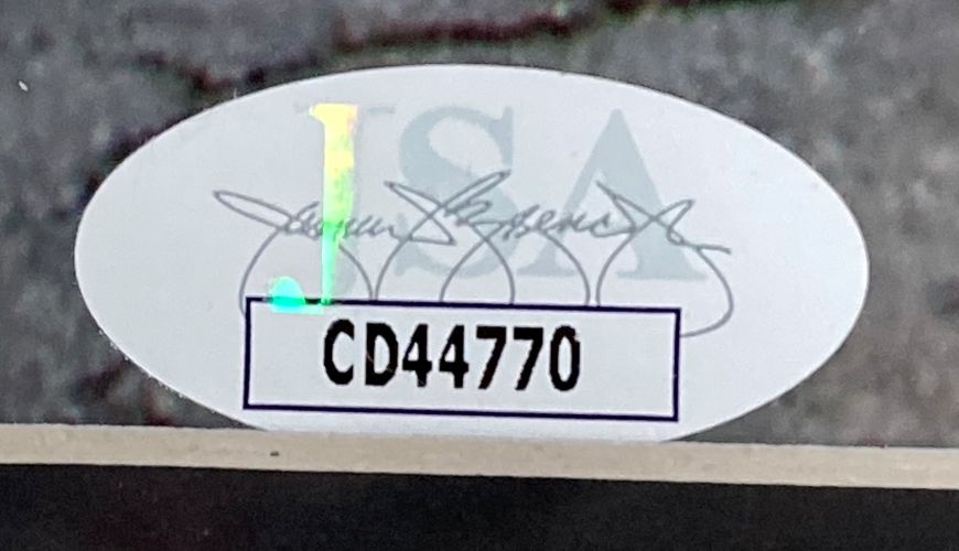 The Chris Pratt Signed Framed 8x10 Guardians Of The Galaxy Running Photo by Sports Integrity features a JSA oval sticker with faint signature, a left holographic strip, and bold code CD44770 in a white rectangle.