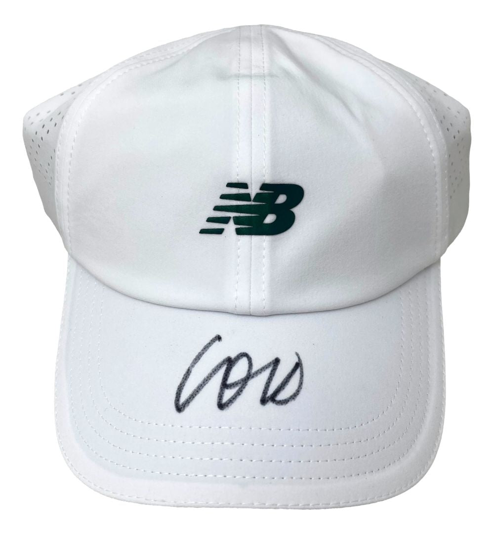 A white adjustable hat from Sports Integrity featuring the New Balance logo on the front and Coco Gauff’s black signature on the bill, authenticated by JSA.