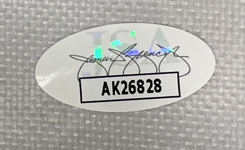A Collin Morikawa Signed Framed 2023 PGA Tour Championship Golf Flag by Sports Integrity features a white oval JSA hologram, black signatures, and printed AK26828 label on a textured gray background.