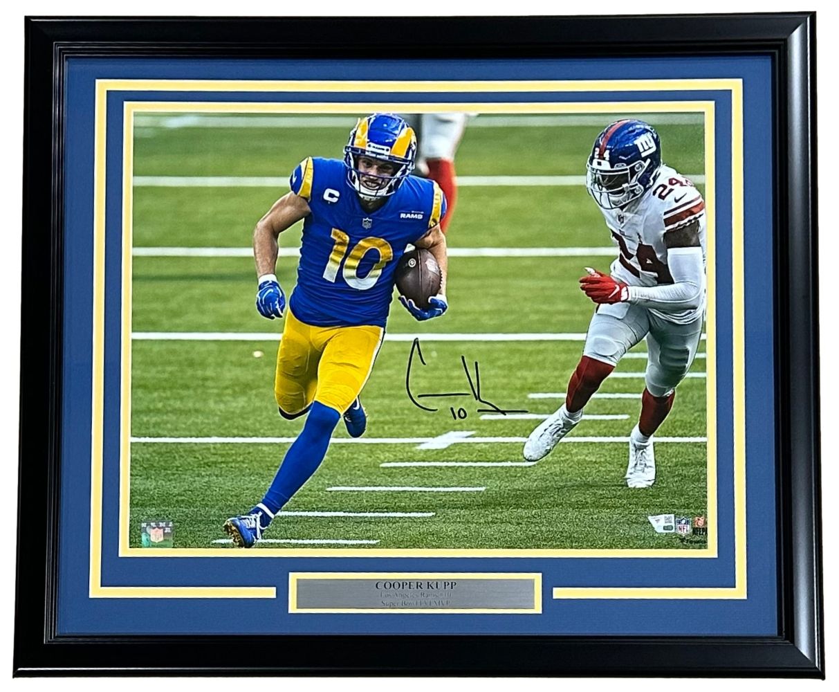 Sports Integrity Cooper Kupp Signed Framed 16x20 Photo vs Giants: Features Kupp (#10) in a Rams uniform running with the ball, autographed and includes a gold COOPER KUPP nameplate.
