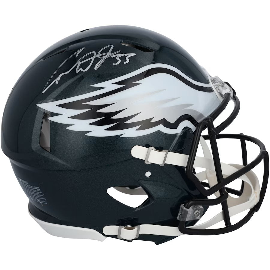 The Cooper DeJean Signed Eagles Super Bowl 59 LIX FS Replica Speed Helmet by Sports Integrity features a black faceguard, the team's white wing logo, and DeJean’s visible silver autograph on top.