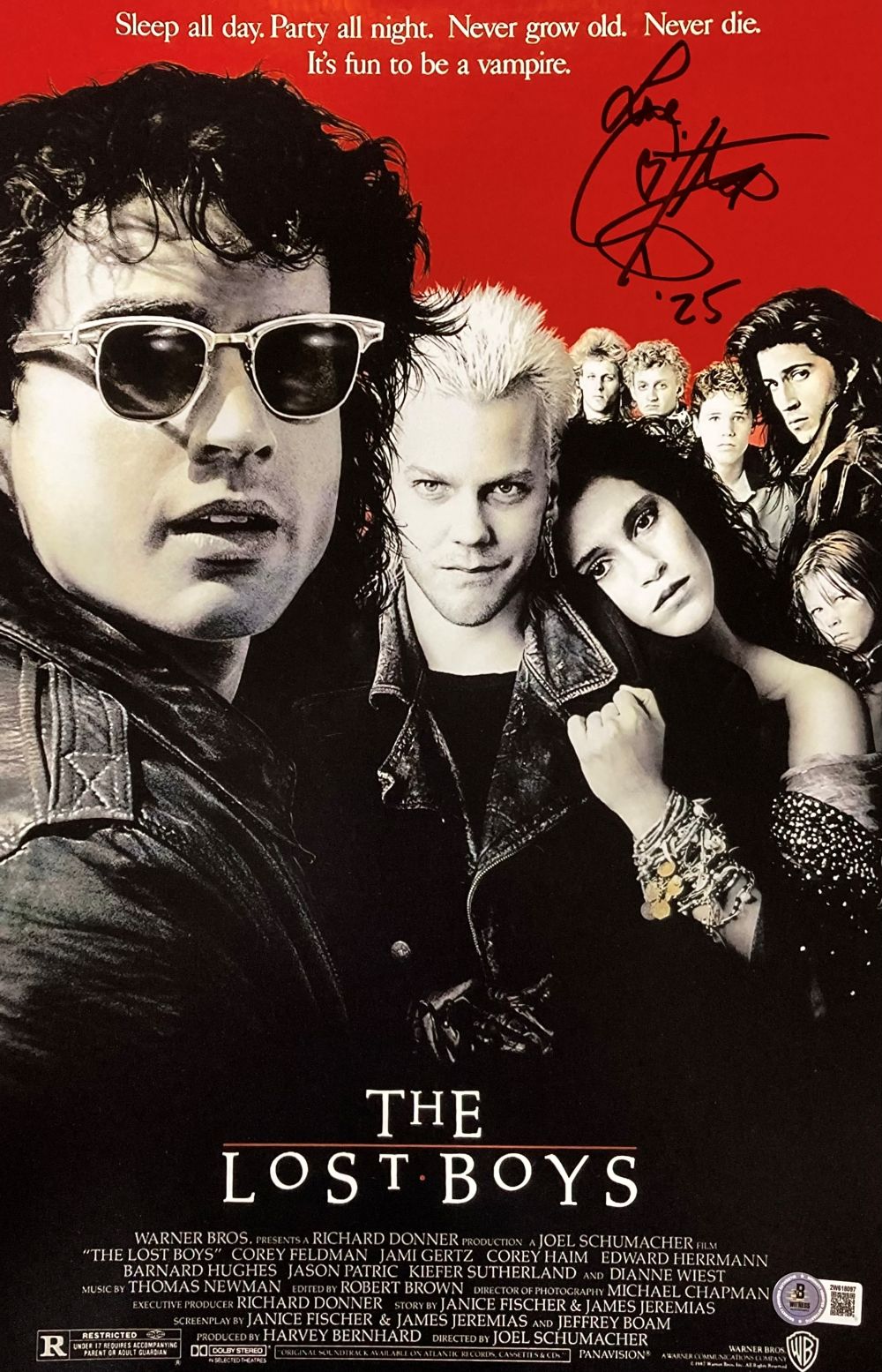 Sports Integrity offers a Corey Feldman Signed 11x17 The Lost Boys Photo, inscribed with "Love" and authenticated by BAS, featuring the iconic movie poster with punk-goth youths and the classic tagline about never growing old.