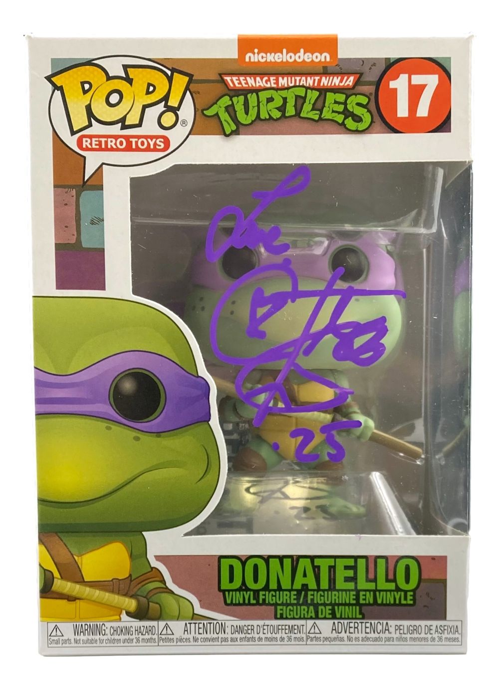 A Corey Feldman Signed Teenage Mutant Ninja Turtles Funko Pop #17 “Love” by Sports Integrity is inside its box, which displays Donatello’s name and image and features the autograph in blue marker.