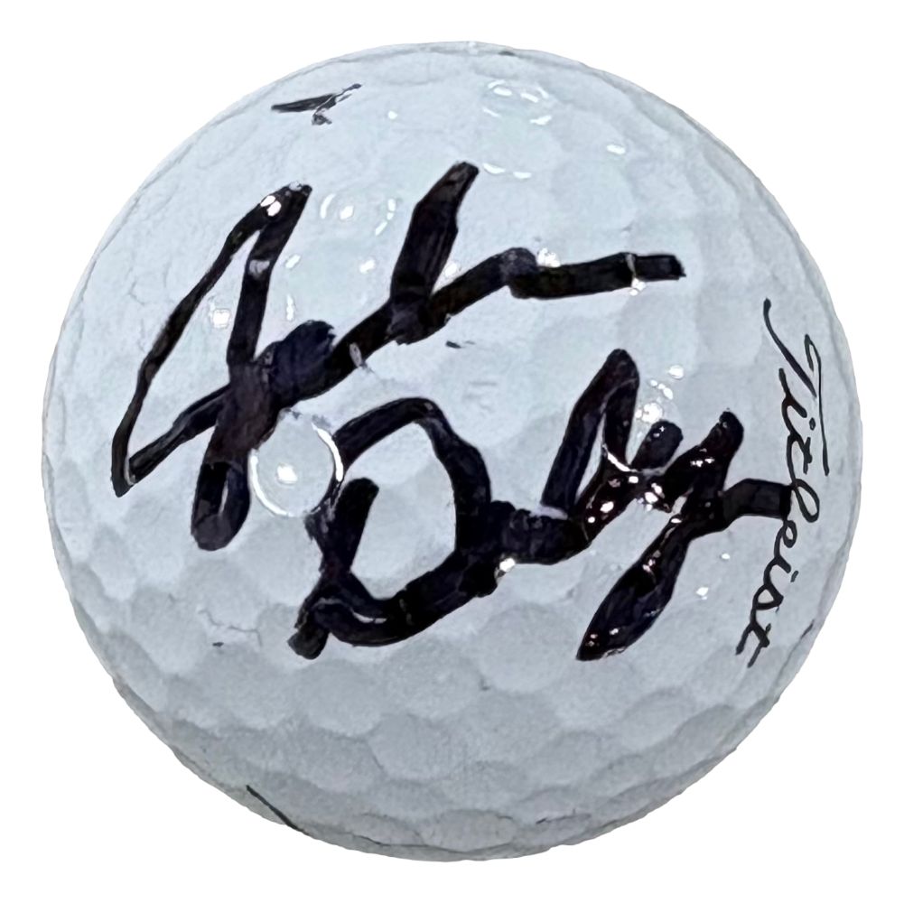 A John Daly signed Titleist golf ball by Sports Integrity, authenticated by PSA/DNA, featuring a bold black autograph.
