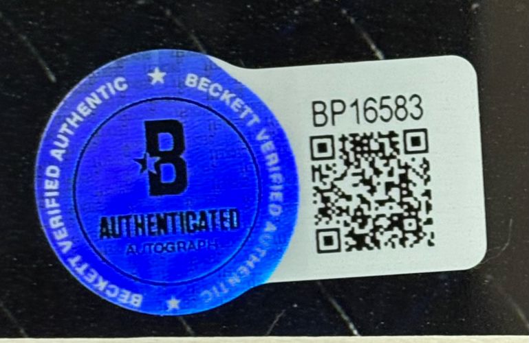 A blue Beckett Authenticated sticker and a white label with code BP16583 and QR code, verifying the autograph, appear on the Dana White Signed Framed 8x10 UFC Photo BAS by Sports Integrity.
