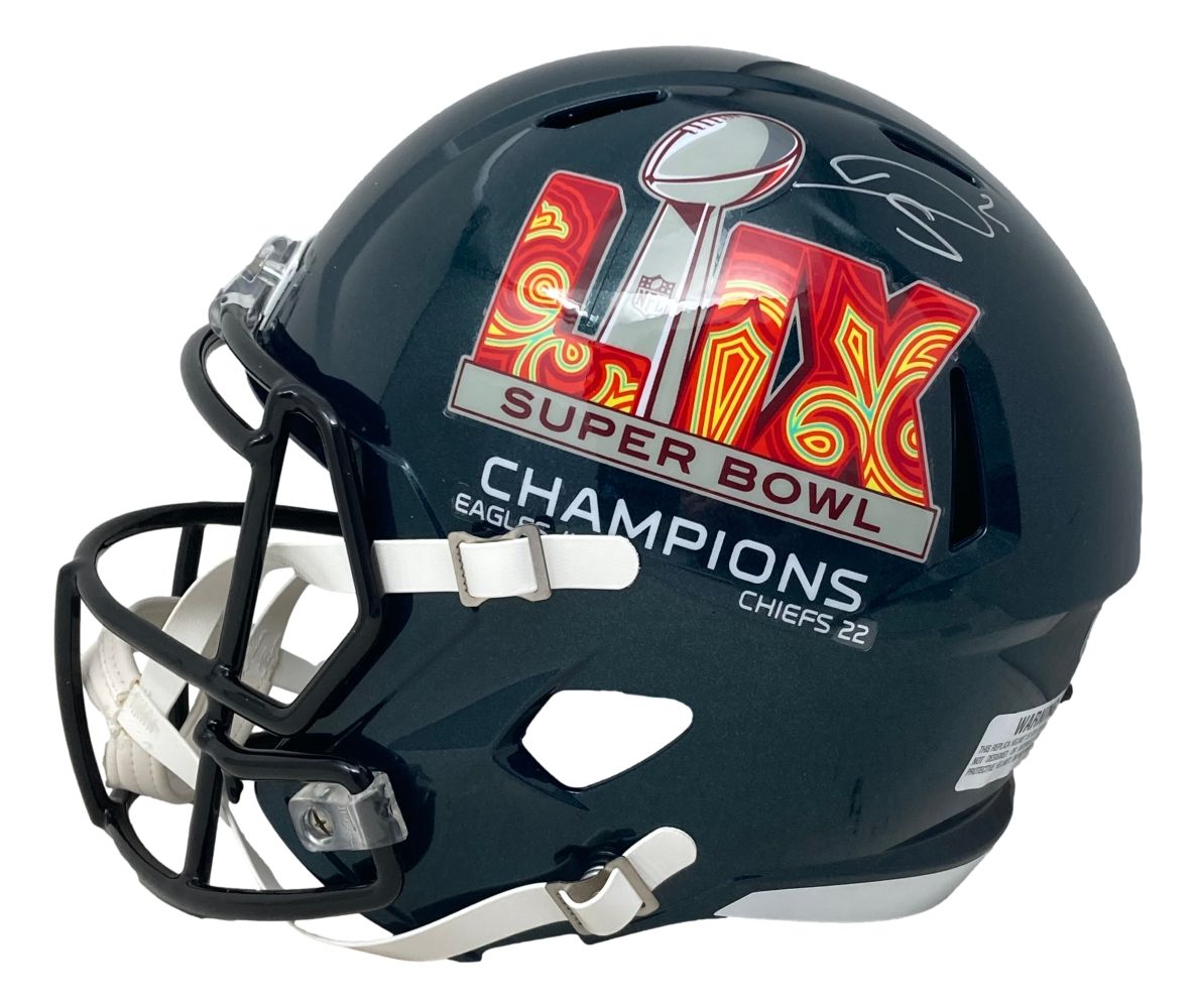 The Darius Slay Signed Philadelphia Eagles FS Super Bowl LIX Replica Helmet by Sports Integrity features “Champions” and includes a football graphic, with his autograph on top.