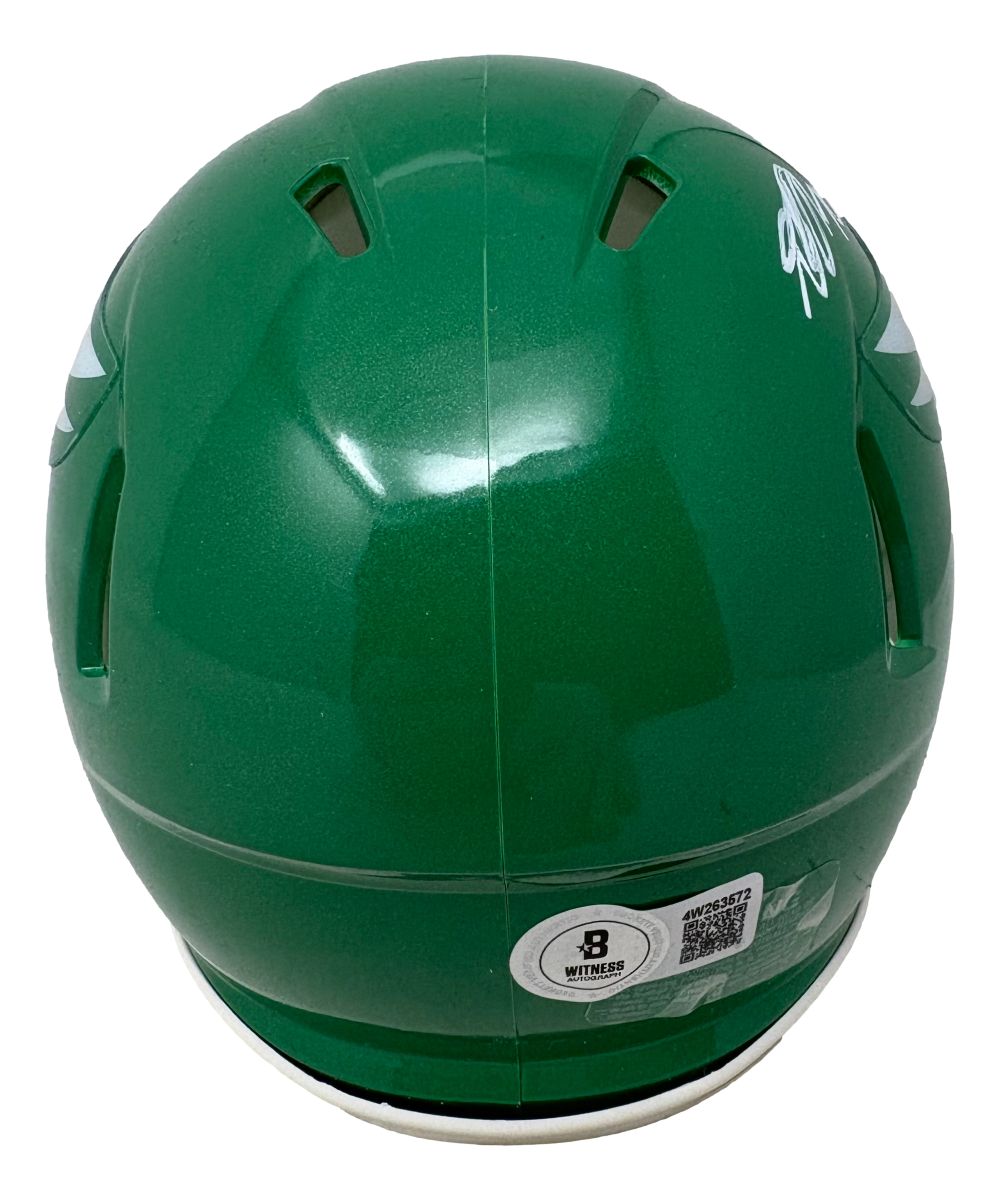 The Sports Integrity DeSean Jackson Signed Philadelphia Eagles Kelly Green Mini Speed Helmet features rear ventilation slots, a white barcode sticker with number on the lower part, and a partially visible helmet brand logo.