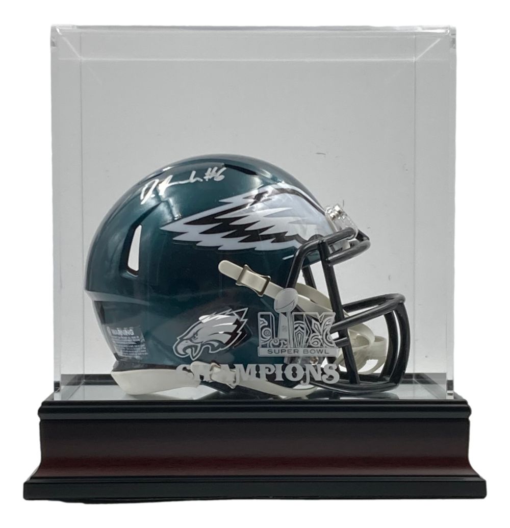 The Sports Integrity Devonta Smith Signed Eagles Mini Speed Helmet comes in a clear display case with a dark base, featuring the Super Bowl LIX logo and "CHAMPIONS" etched on the front.