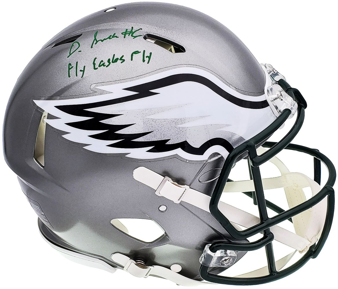 The Sports Integrity DeVonta Smith Signed Eagles FS Flash Authentic Speed Helmet features a green autograph and “Fly Eagles Fly” inscription on the top, plus the team’s wing logo on a silver shell.