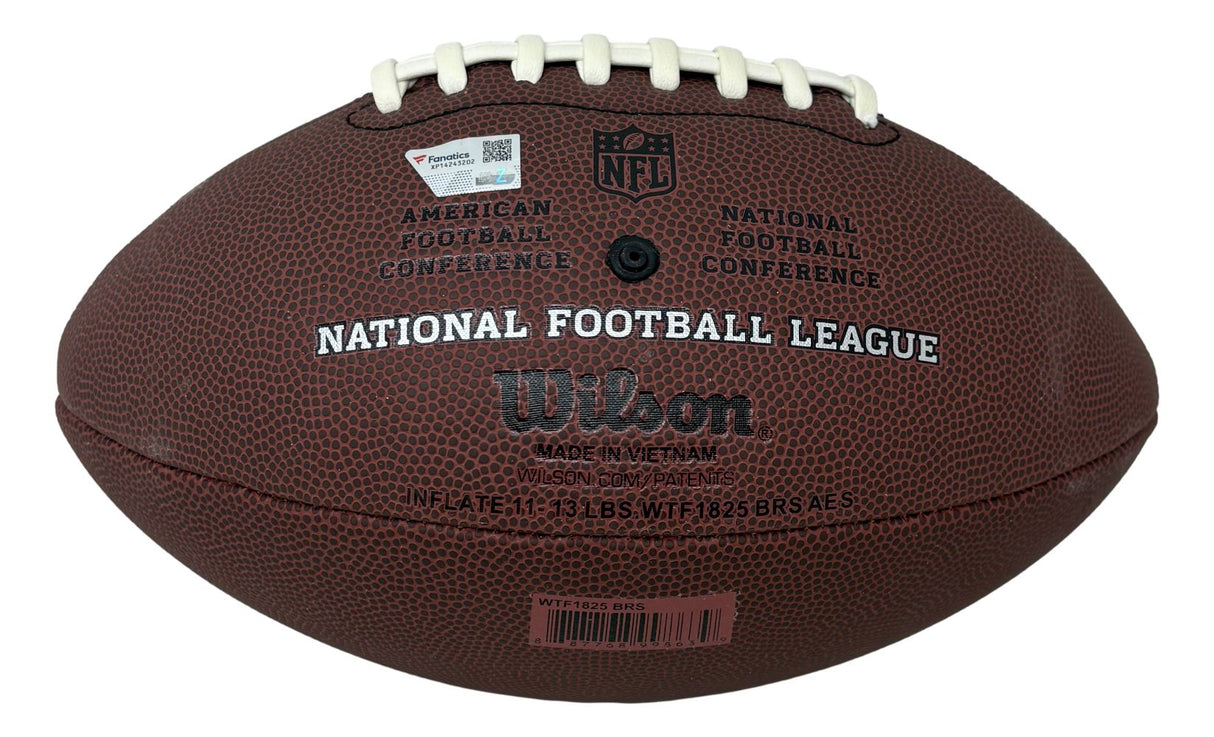 A full-size replica NFL Duke football by Sports Integrity, featuring Eli Manning’s signature and New York Giants details. The brown ball includes white laces and official manufacturer markings.