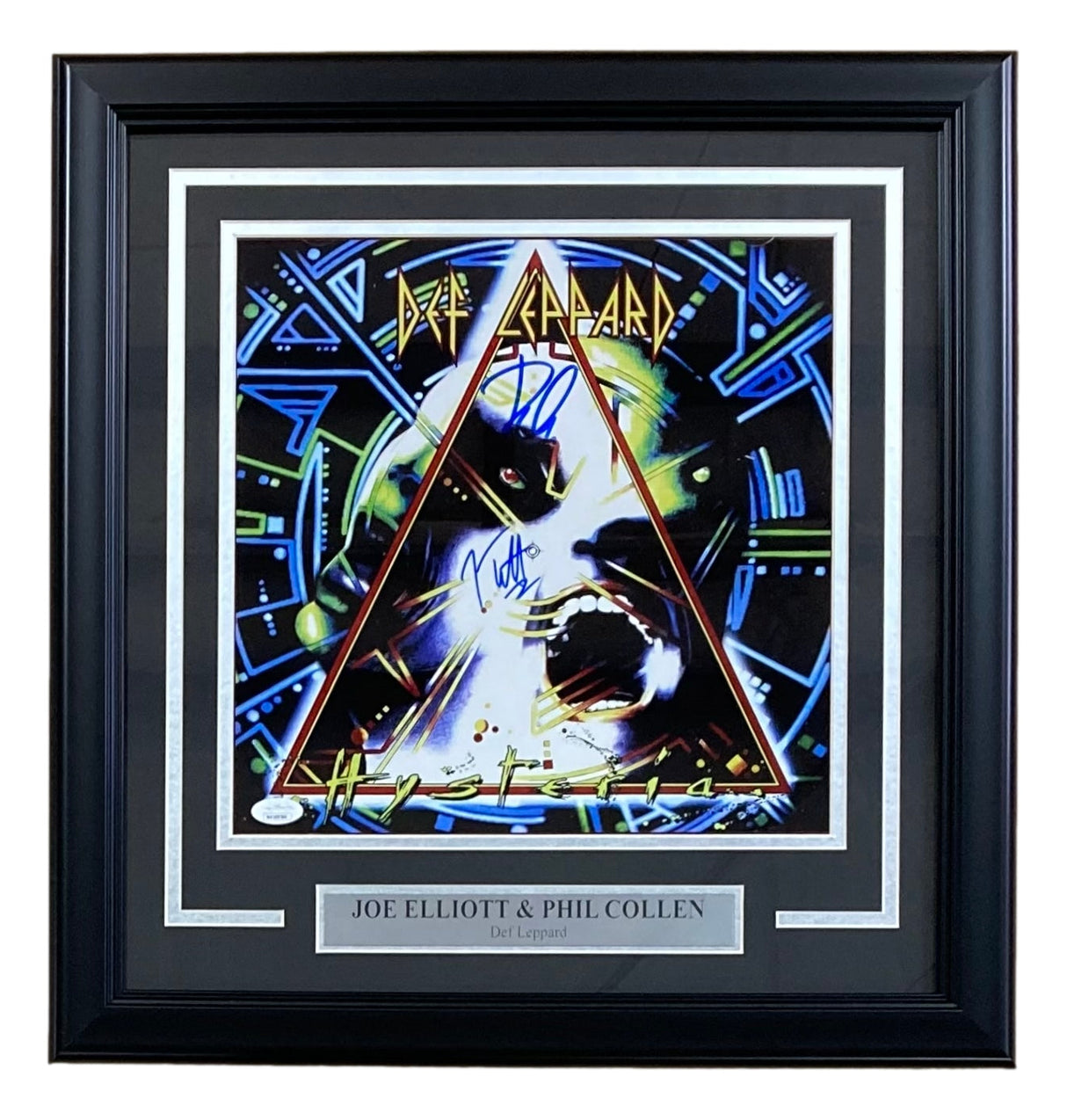 Sports Integrity Joe Elliott Phil Collen Signed Framed 12x12 Def Leppard Photo JSA ITP features vibrant Hysteria album art with a face in a triangle, band signatures, and a plaque reading Joe Elliott & Phil Collen, Def Leppard.