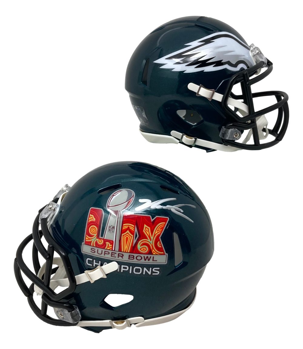 Two views of the Jalen Carter Signed Philadelphia Eagles Super Bowl 59 Mini Speed Helmet by Sports Integrity, autographed in silver above the SB logo and featuring Eagles graphics.