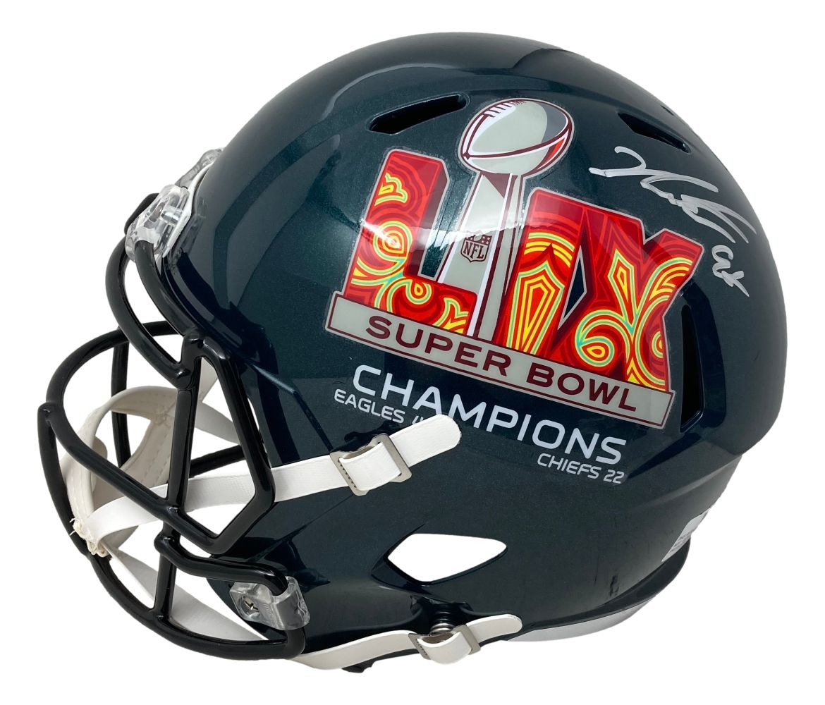 The Sports Integrity Jalen Carter Signed Philadelphia Eagles FS Super Bowl 59 Replica Helmet features a dark shell, large SB 59 logo, CHAMPIONS text, final score, signature, white chin strap, and black facemask.