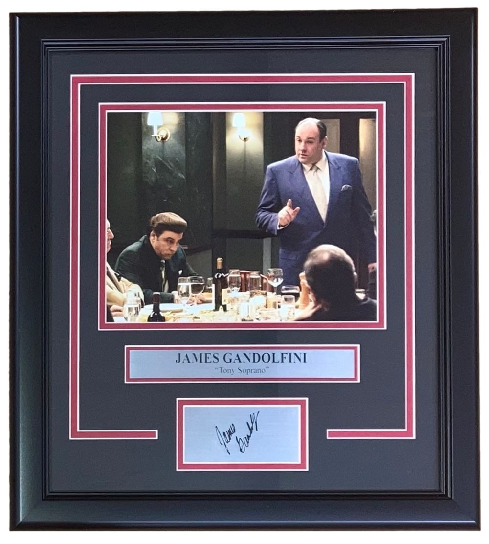 The Sports Integrity James Gandolfini Framed 8x10 Tony Soprano Photo features a laser engraved signature, nameplate, and red and white matting, perfect for Sopranos fans.