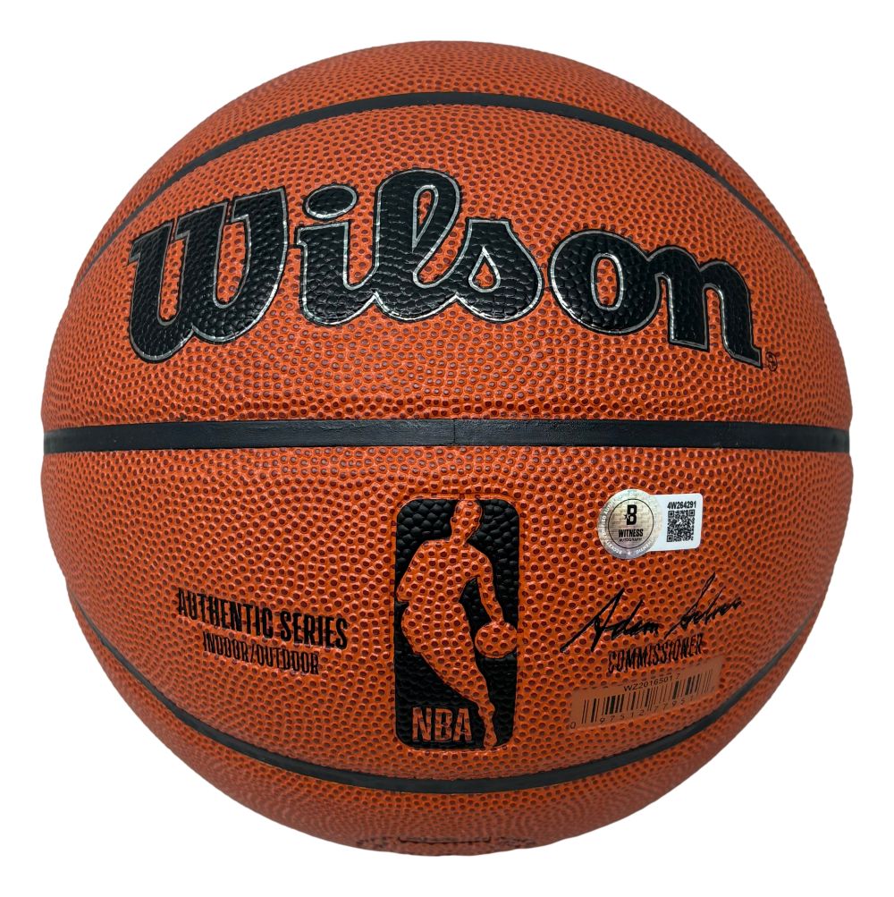 A Jaylen Brown Boston Celtics Signed Wilson I/O Basketball by Sports Integrity features his autograph, black lettering, NBA logo, and commissioner’s signature.
