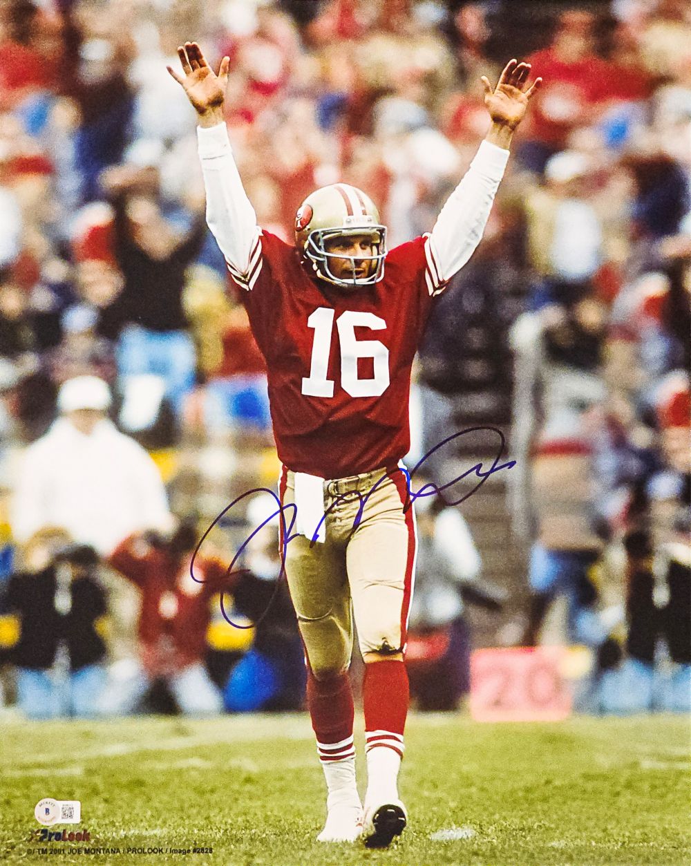 A Joe Montana Signed 16x20 San Francisco 49ers Photo from Sports Integrity shows Montana in a red #16 jersey raising both arms in celebration on the field, with blurred spectators in the background.