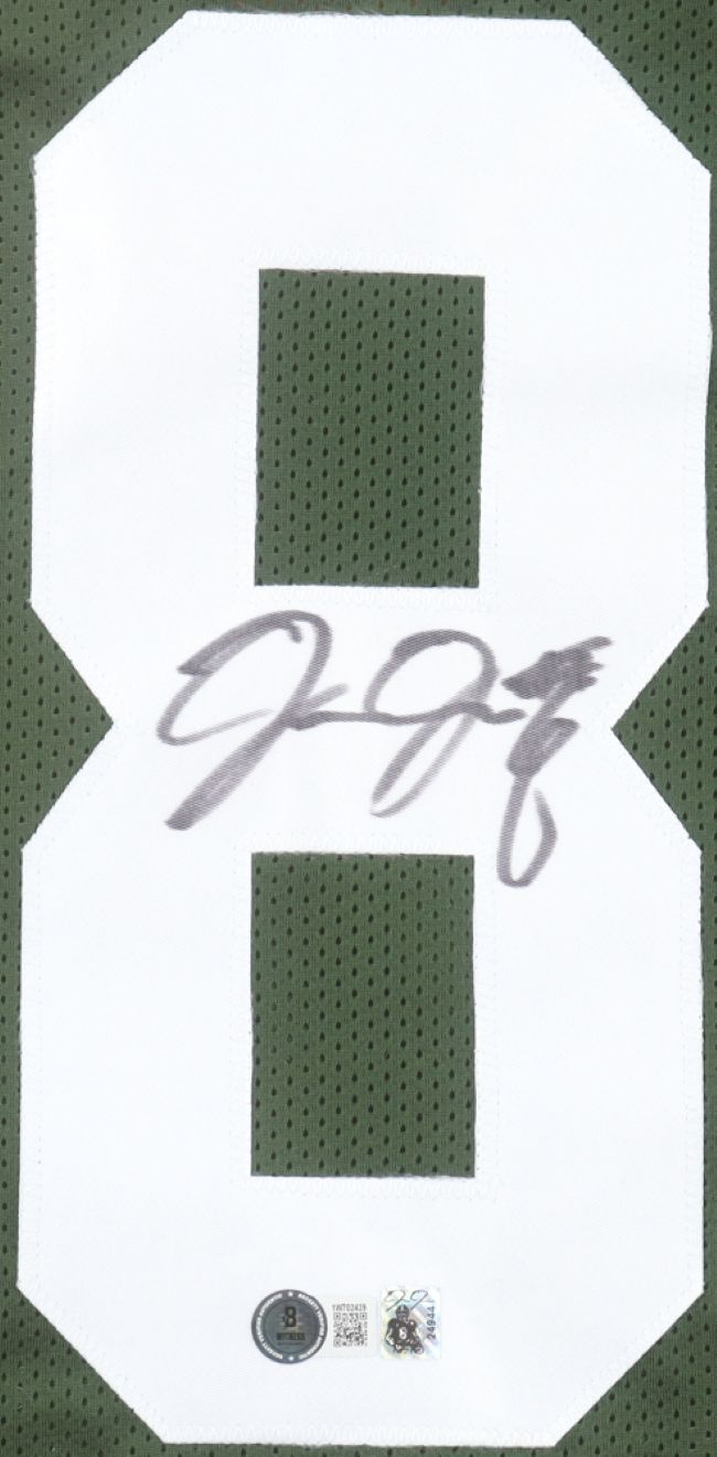 Sports Integrity Josh Jacobs Green Bay signed green mesh football jersey features a large white number 8 autographed in black marker, with two certification stickers at the bottom of the number.