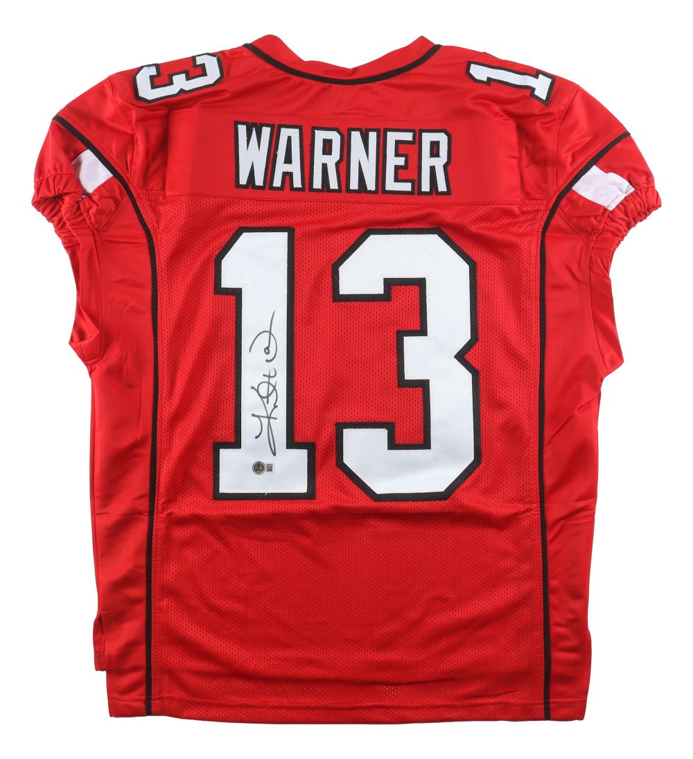 The Sports Integrity Kurt Warner Arizona Signed Red Pro-Cut Football Jersey BAS features "WARNER" and number 13 in white/black, with the number autographed in black marker on the lower left back.