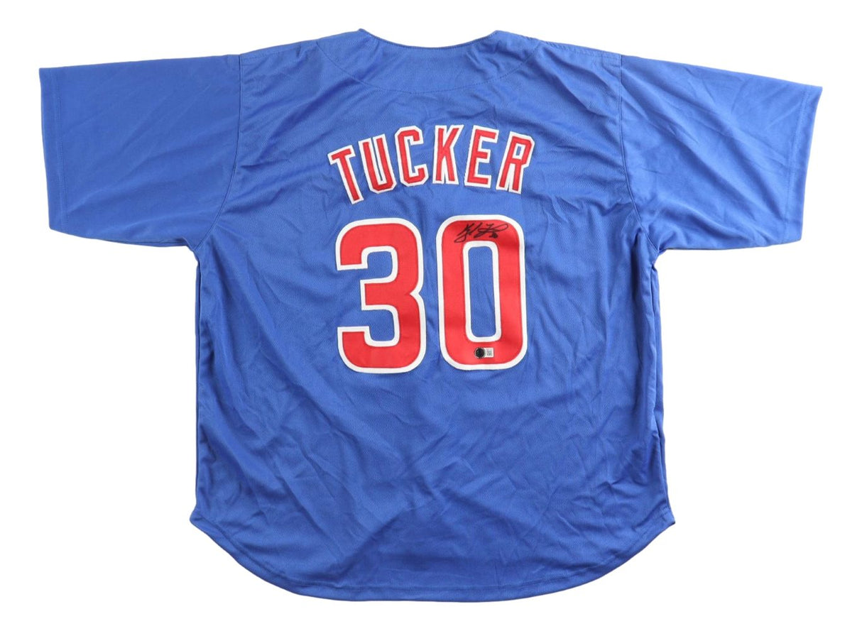 The Sports Integrity Kyle Tucker Chicago Signed Blue Baseball Jersey BAS is blue with red and white trim, features TUCKER and the number 30 on the back, and includes a signature on the number zero.