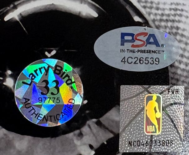 This Sports Integrity Larry Bird Signed 8x10 Boston Celtics Photo w/ Red Auerbach features a holographic AUTHENTICATED sticker (33 97775), PSA/DNA oval (4C26539), and square NBA logo sticker (NC04683805).
