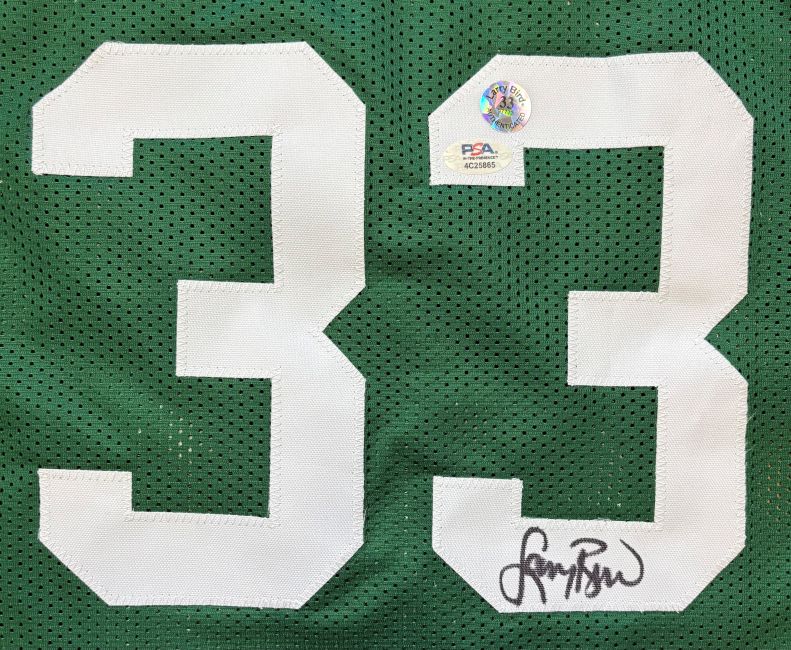 Sports Integrity's Larry Bird Boston green basketball jersey features large white number 33, a PSA/DNA authentication sticker above the numbers, and Bird's black signature near the bottom of the right "3.