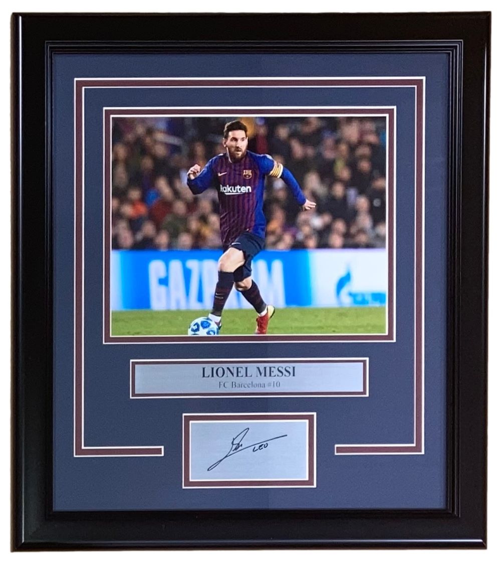 The Sports Integrity Lionel Messi Framed 8x10 Barcelona FC Photo features a laser-engraved signature and nameplate, showcasing Messi in his #10 uniform with the ball.