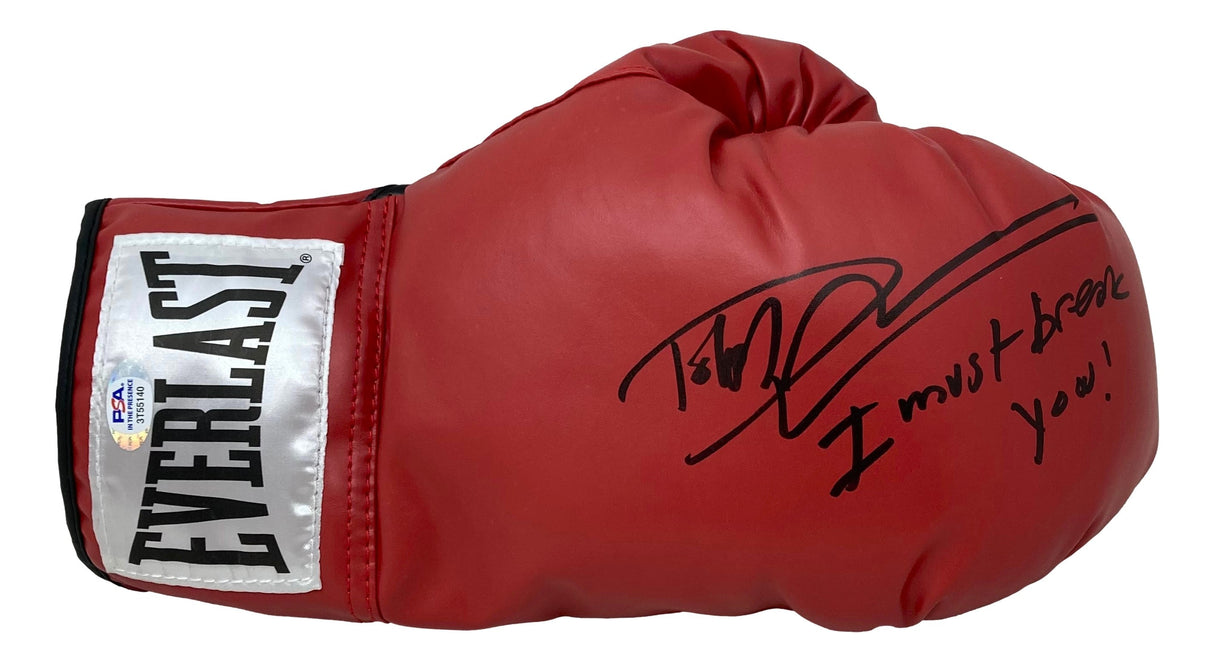 A Dolph Lundgren signed red Everlast boxing glove with "I Must Break You" inscription, PSA ITP authenticated. Features a white Everlast label and small wrist sticker. Sold by Sports Integrity.