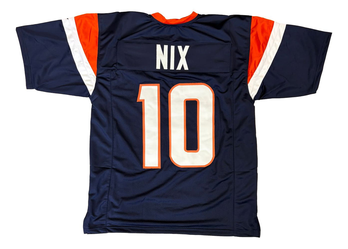 The Sports Integrity Bo Nix Denver Navy Blue Football Jersey features orange and white accents, with "NIX" and the number 10 in bold white letters on the back.