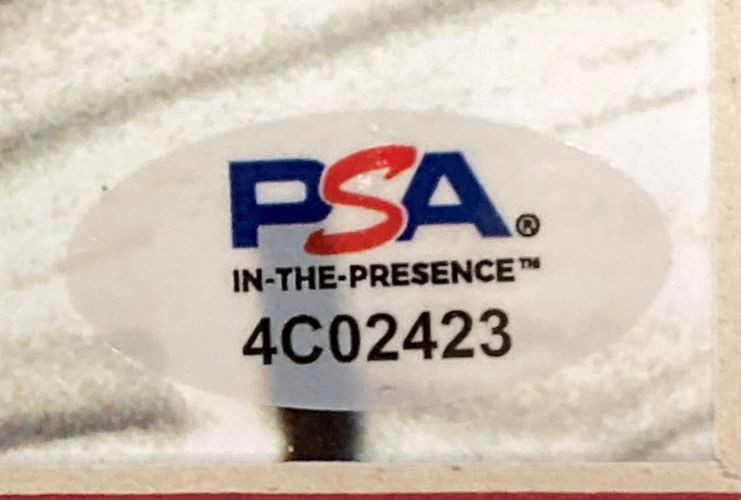This Nolan Ryan Signed Framed 8x10 Texas Rangers Ventura Fight Photo by Sports Integrity features a PSA/DNA oval sticker with blue and red "PSA," black "IN-THE-PRESENCE™," and serial number 4C02423 at the bottom.