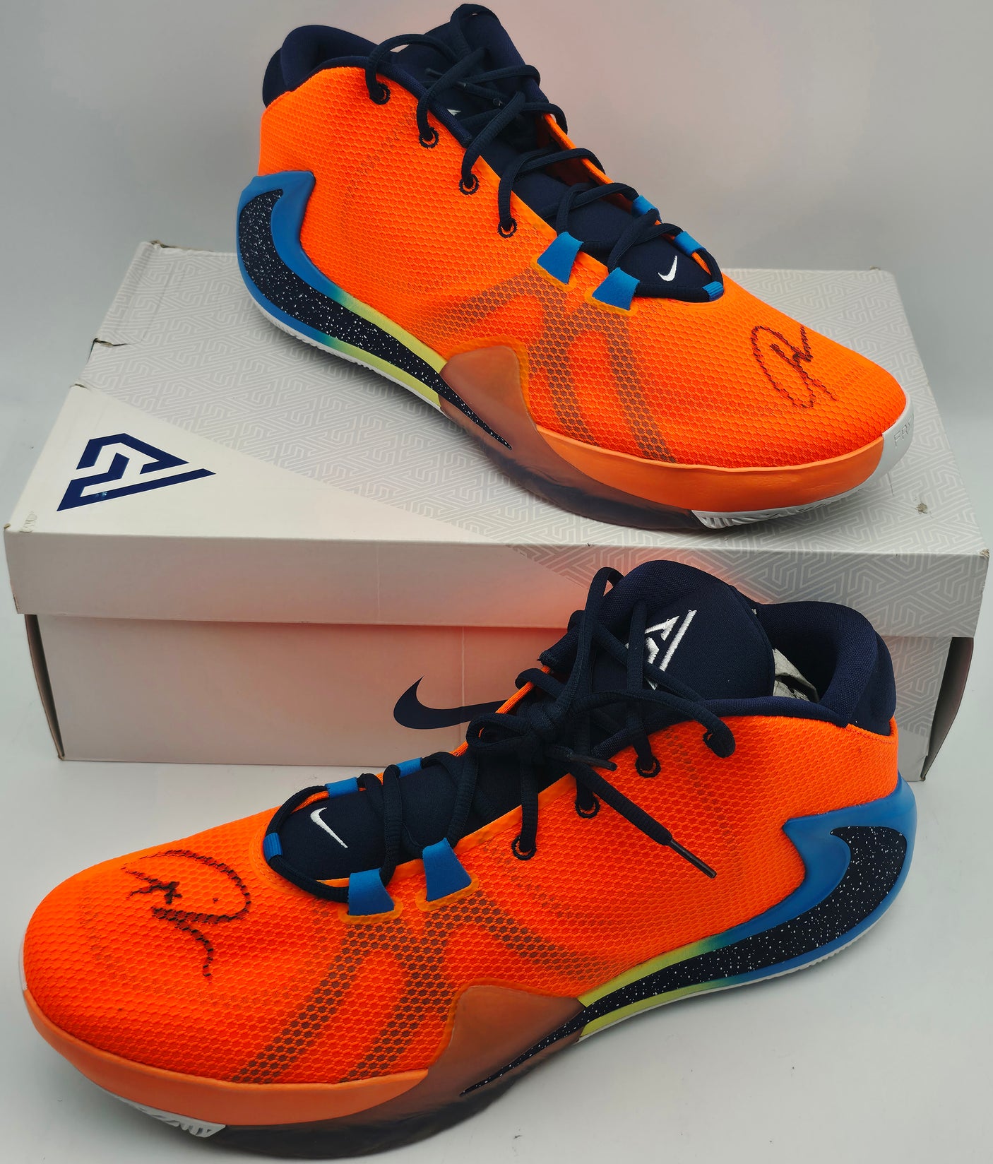 Giannis Antetokounmpo Autographed 2019 Player Exclusive (PE) Promo Total Orange, Mid Navy & Phantom Blue Nike Zoom Freak 1 Shoes Milwaukee Bucks Size 17 (With Box) Beckett BAS Witness #3W396742 & #3W396743