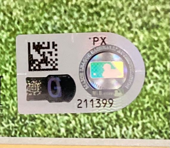 Close-up of the official MLB authentication sticker with QR code, holographic logo, and serial number 211399 on the Sports Integrity Paul Skenes Signed Framed 16x20 Pittsburgh Pirates Debut Photo.