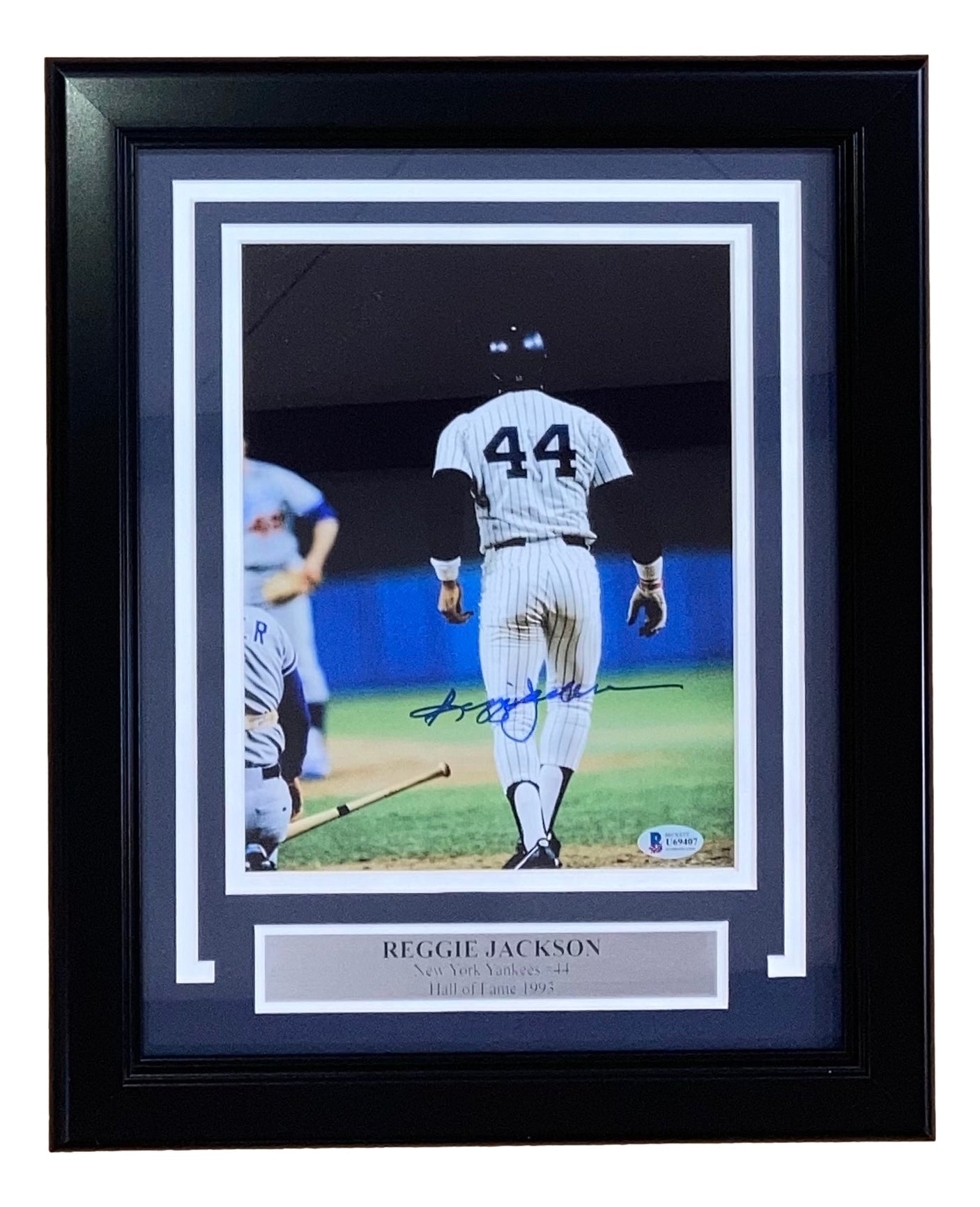 Sports Integrity Reggie Jackson Signed Framed 8x10 Home Run Photo features the Yankees legend in uniform (#44), includes autograph and Hall of Fame plaque.