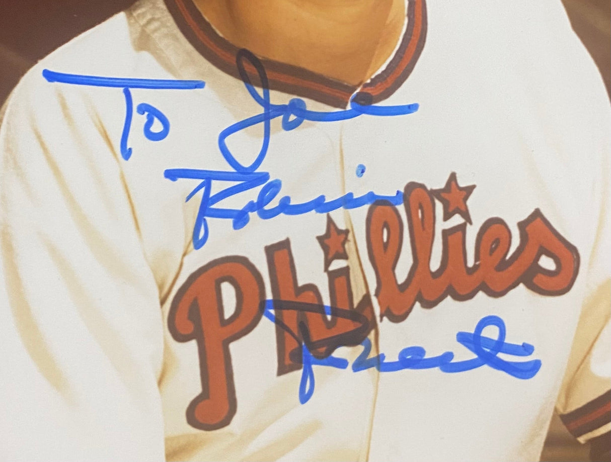 Close-up of a Robin Roberts Signed 8x10 Philadelphia Phillies Photo (JSA AL44181) by Sports Integrity, featuring a blue autograph and partially legible personalized message addressed to Joe.