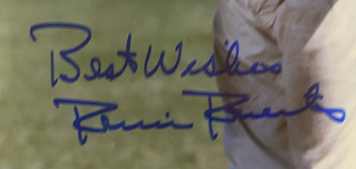 A blue autograph on an 8x10 photo reads “Best Wishes, Robin Roberts,” authenticated by JSA (AL44180); sold by Sports Integrity, with a person's beige sleeve visible on the right against a blurred background.