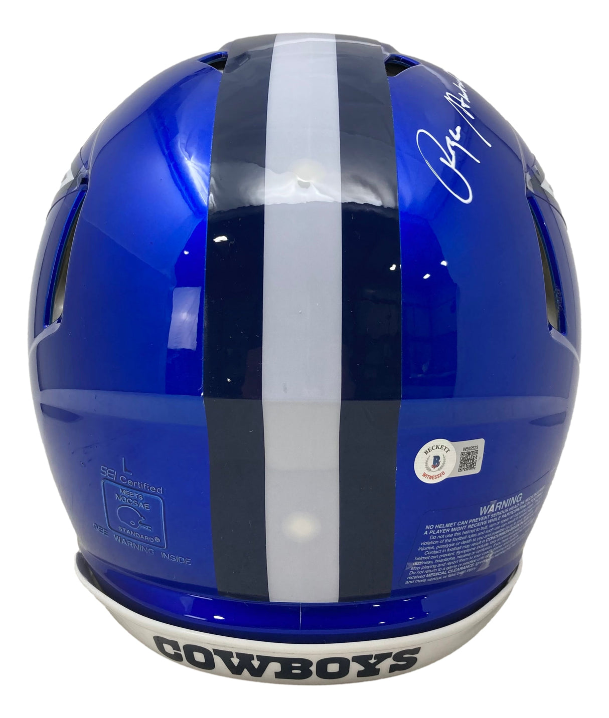 The Sports Integrity Roger Staubach Signed Cowboys FS Flash Authentic Speed Helmet features a blue shell, central white stripe, “COWBOYS” chin strap, signature, certification stickers, and barcode on the back.