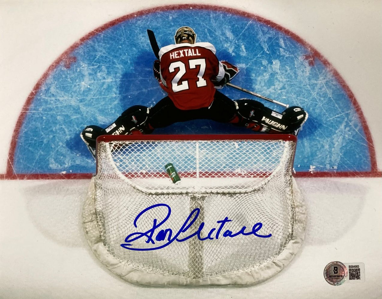 This Sports Integrity Ron Hextall Signed 8x10 Philadelphia Flyers Photo shows Hextall in net making a split save, with his jersey number 27 visible. The autograph is in blue ink and comes with BAS certification.