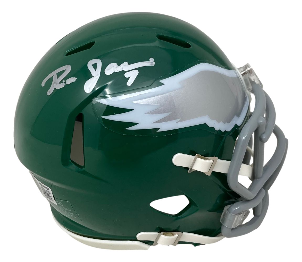 The Sports Integrity Ron Jaworski Signed Philadelphia Eagles Kelly Green Mini Speed Helmet features a white and silver wing logo, a grey facemask, and a white autograph on top.