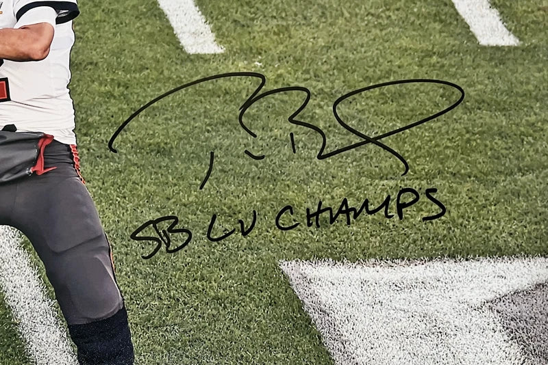 Tom Brady Tampa Bay Buccaneers Autographed 16" x 20" Super Bowl LV Champions Super Bowl LV Action Photograph with "LV CHAMPS" Inscription Fanatics