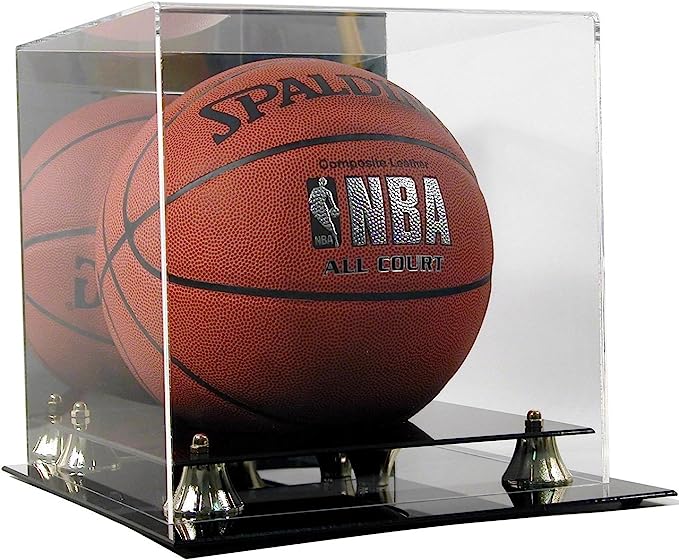 The Deluxe Acrylic Basketball Display Case by Sports Integrity showcases a basketball in a clear rectangular acrylic case with a black base and four metal corner supports.
